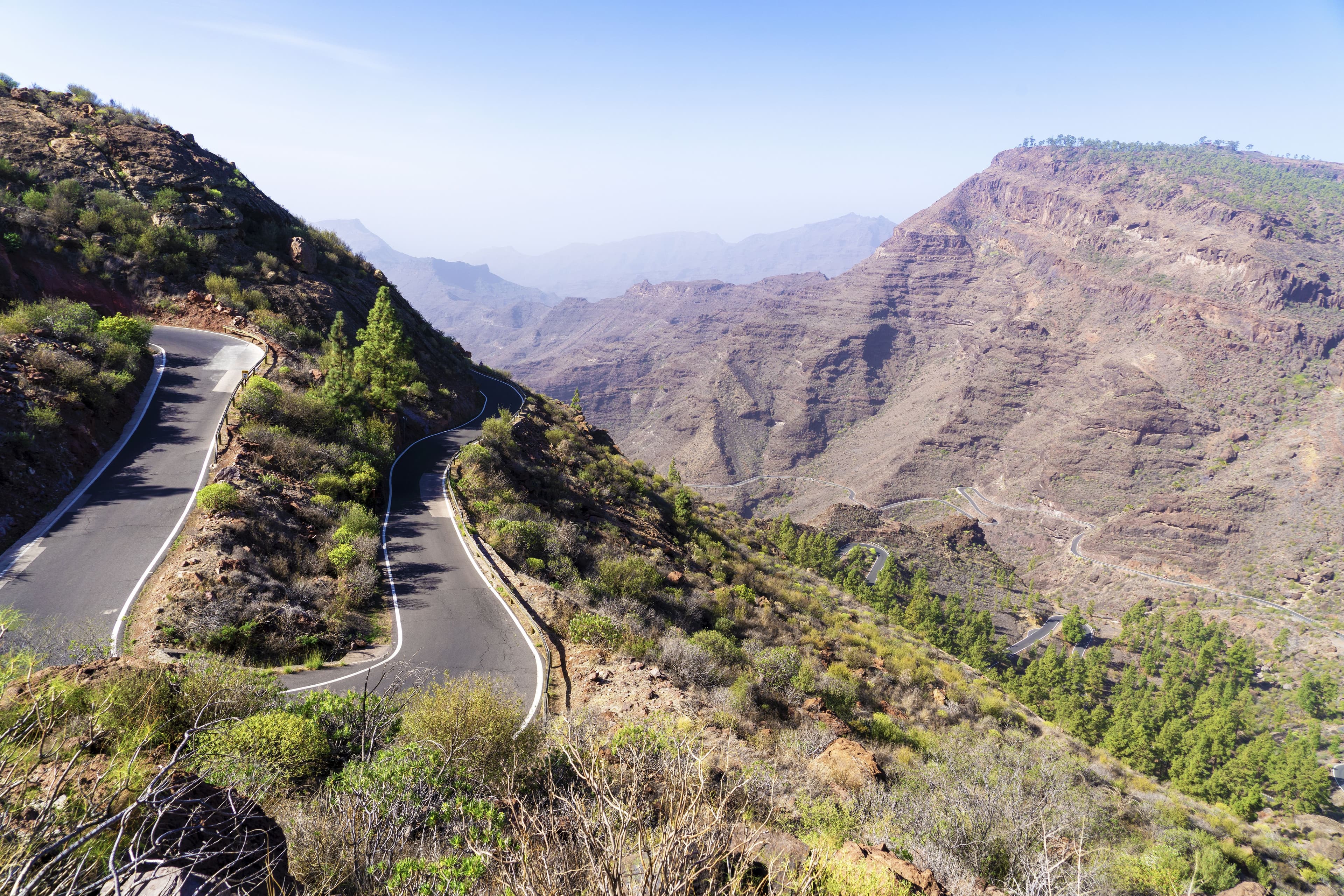 A hairpin mountain road on Gran Canaria seen from above